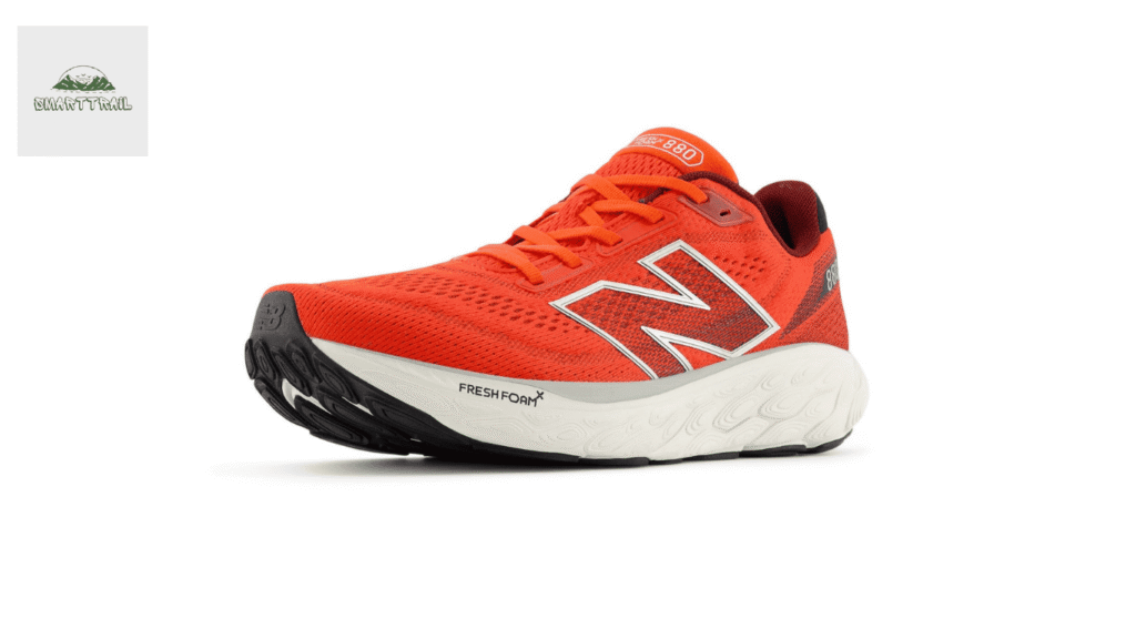 Chaussure de running New Balance Fresh Foam X 880 v13 orange vif sur fond blanc